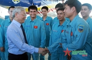 Party General Secretary Nguyen Phu Trong and naval troops